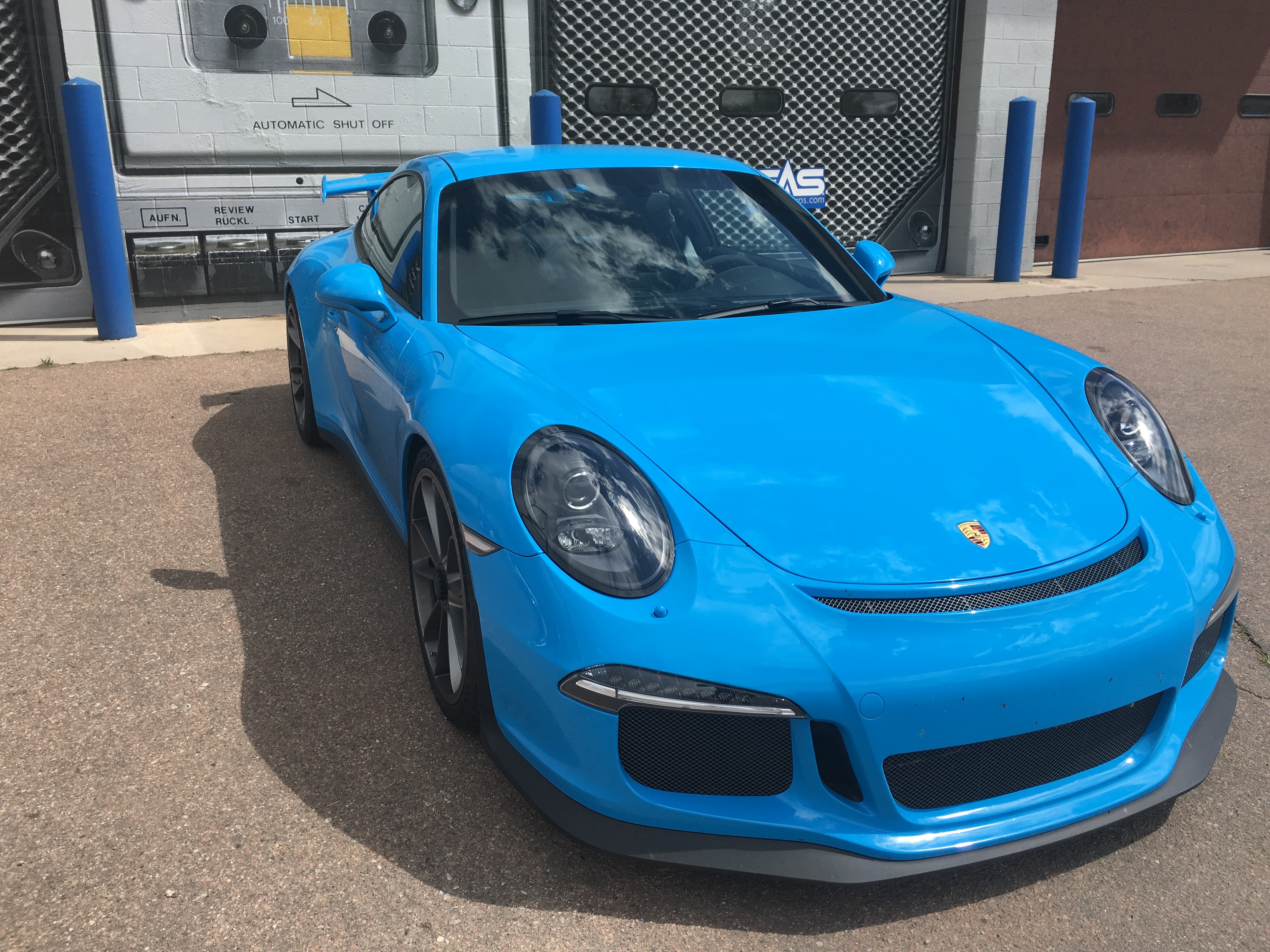 Blue Porsche GT3 RS front three-quarter view