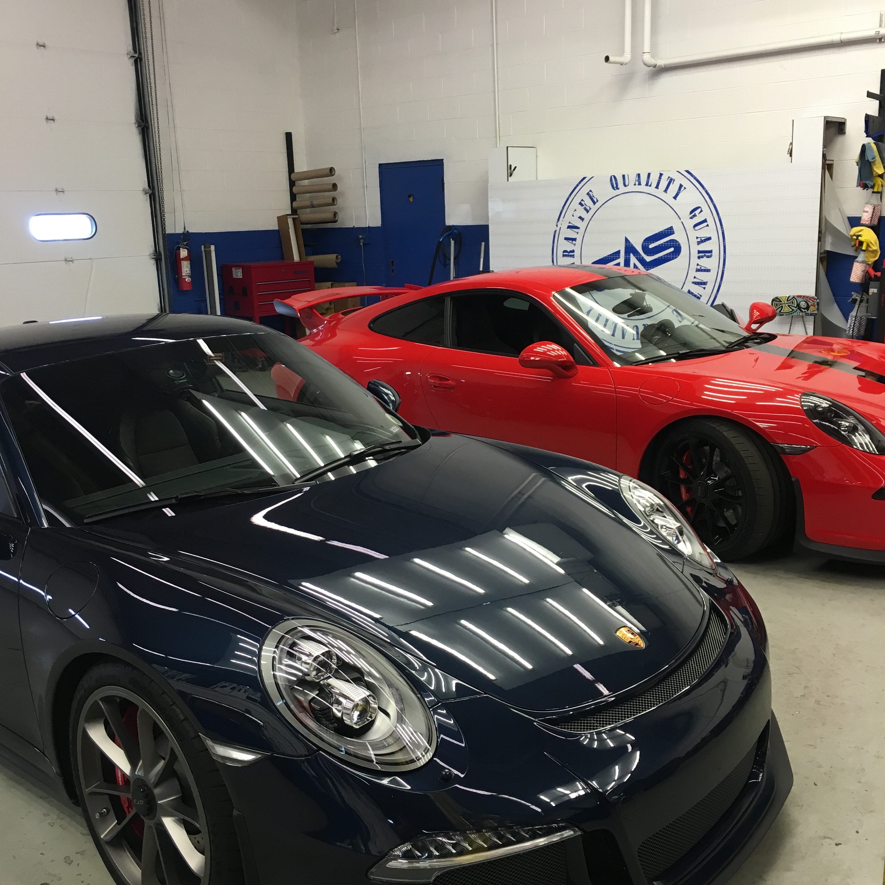 Multiple Porsches at the shop