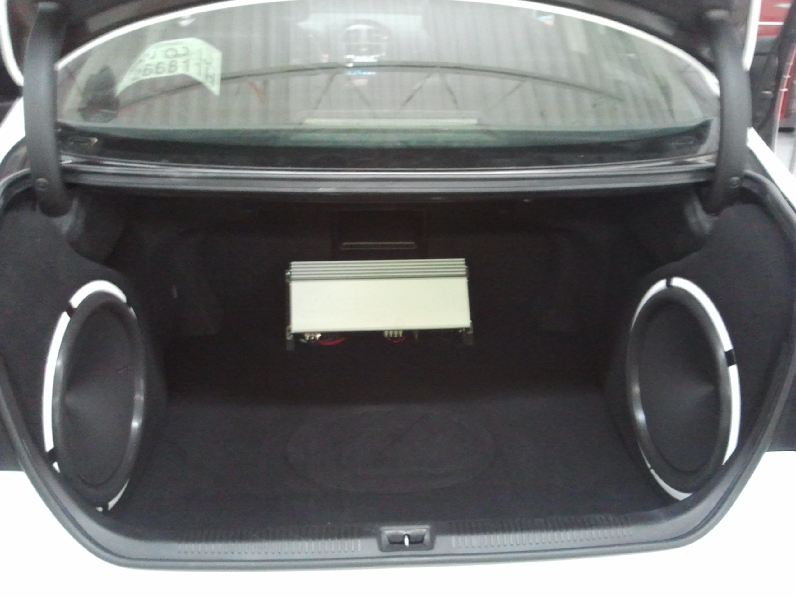 Custom car audio trunk build with amplifiers and subwoofers